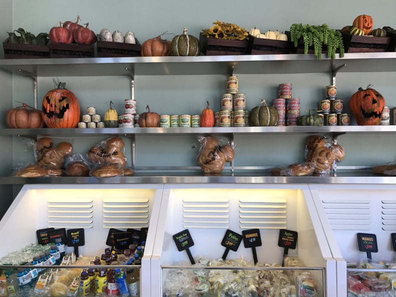 The shelves at Fairfax Market feature Halloween decor.