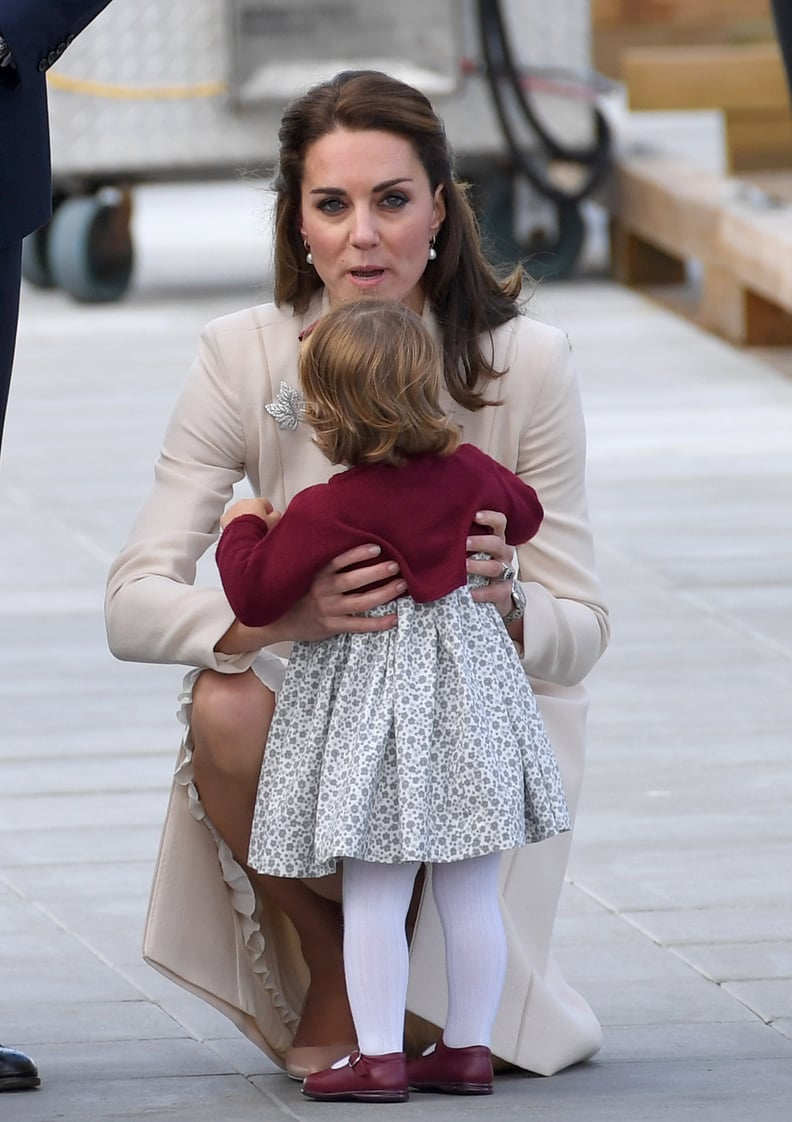 Kate Picking Up Charlotte, 2016