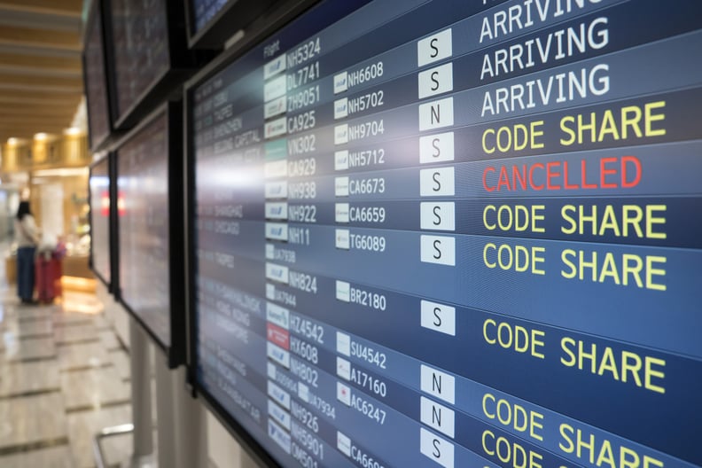 NARITA, JAPAN - JANUARY 24: A monitor displays airline departure information at Narita airport on January 24, 2020 in Narita, Japan. While Japan is one of the most popular foreign travel destinations for Chinese tourists during the Lunar New Year holiday 