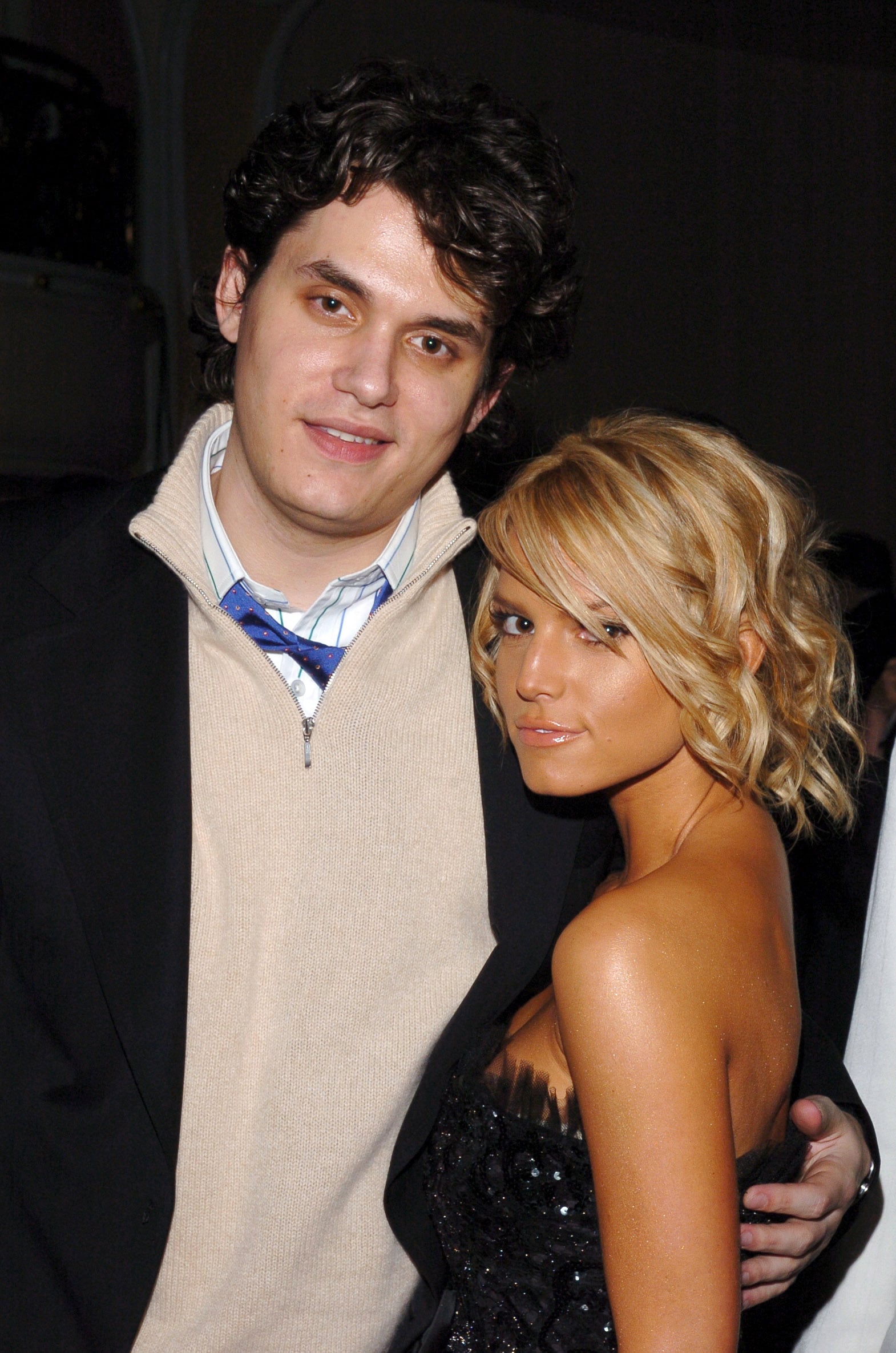 John Mayer posed with a very tan Jessica Simpson in 2005. One year later, they started dating.