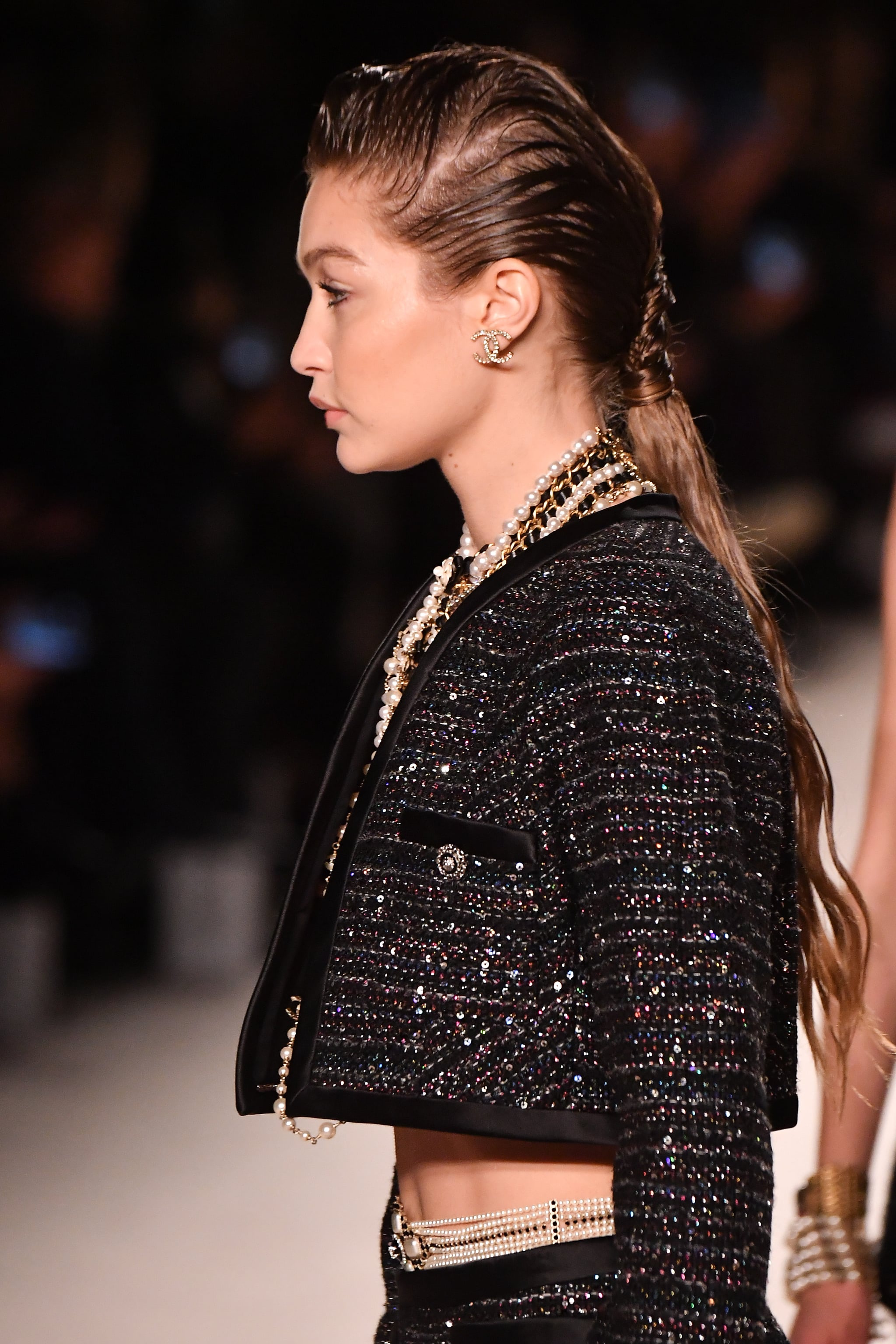 Gigi Hadids Wet Ponytail At The Chanel Métiers Dart 2019