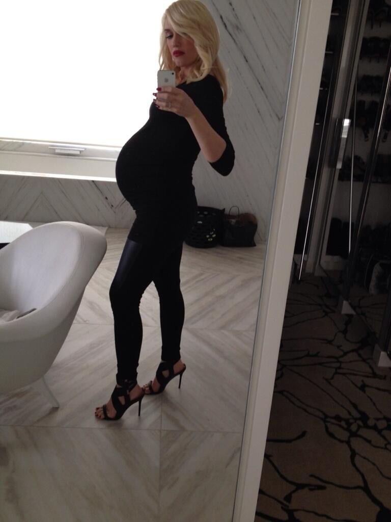 Gwen Stefani shared a photo of her baby bump, saying, "bump it #allblack #inappropriateshoes #capturethemoment #miracle."
Source: Twitter user gwenstefani