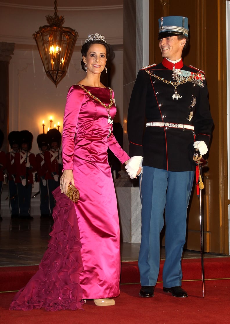 But Marie's Wardrobe Isn't For the Faint of Heart — She Takes Her Hot Pink in Satin With a Side of Ruffles