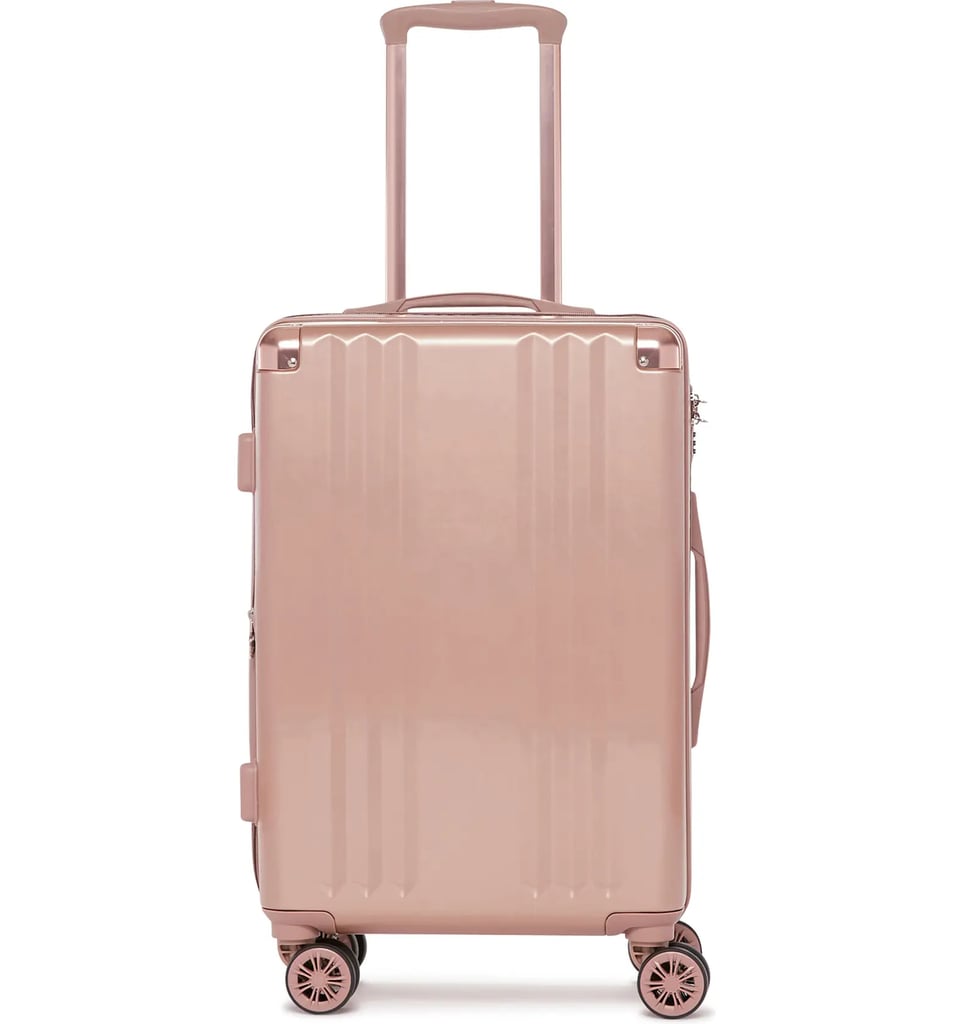 Best Pink Suitcase: Calpak Ambeur 22-Inch Rolling Spinner Carry-On