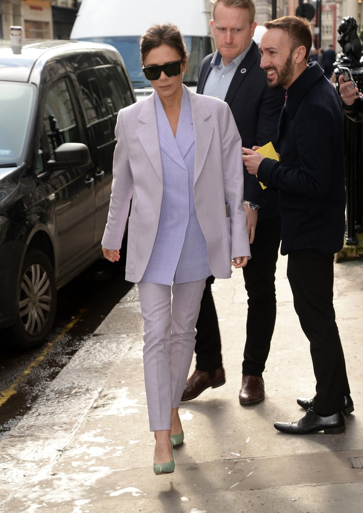 Victoria Beckham Wearing a Purple Suit