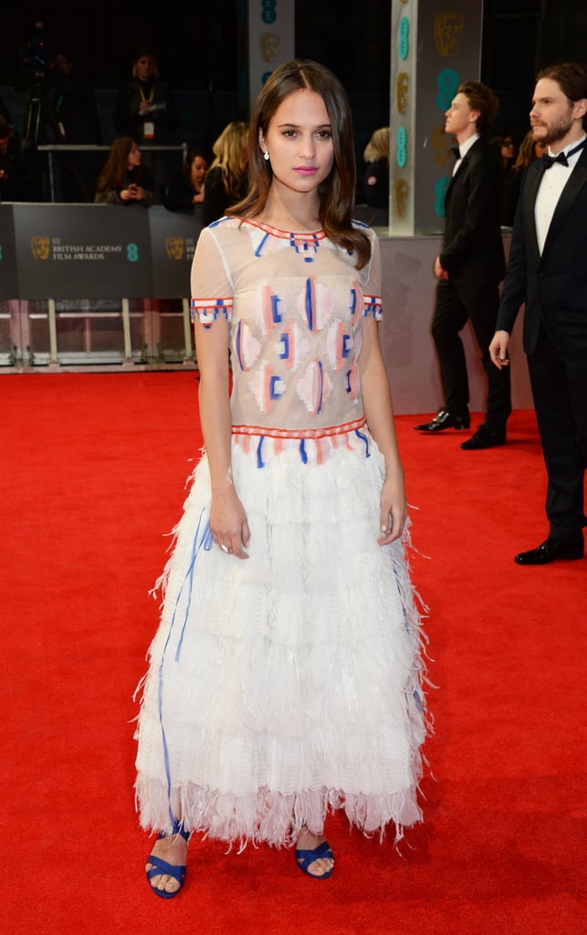 Alicia wore a feathered Chanel Couture dress on the BAFTA red carpet in 2014.