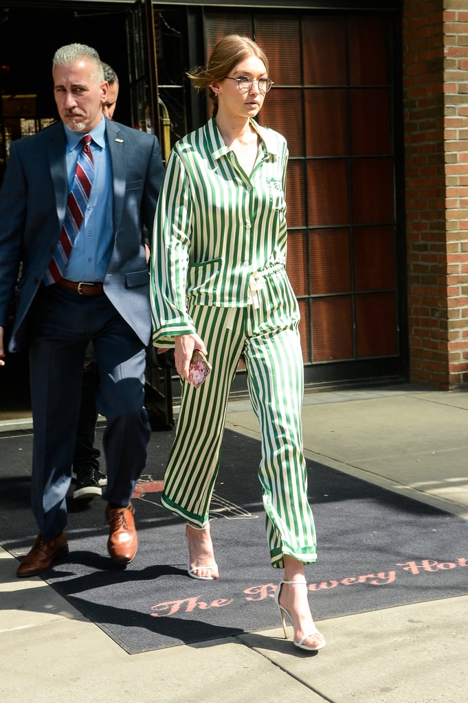 Gigi Hadid skipped her usual sexy lingerie look for a relaxed, yet stylish pair of Morgan Lane striped PJs. She wore the look with heels to give it a daytime feel.