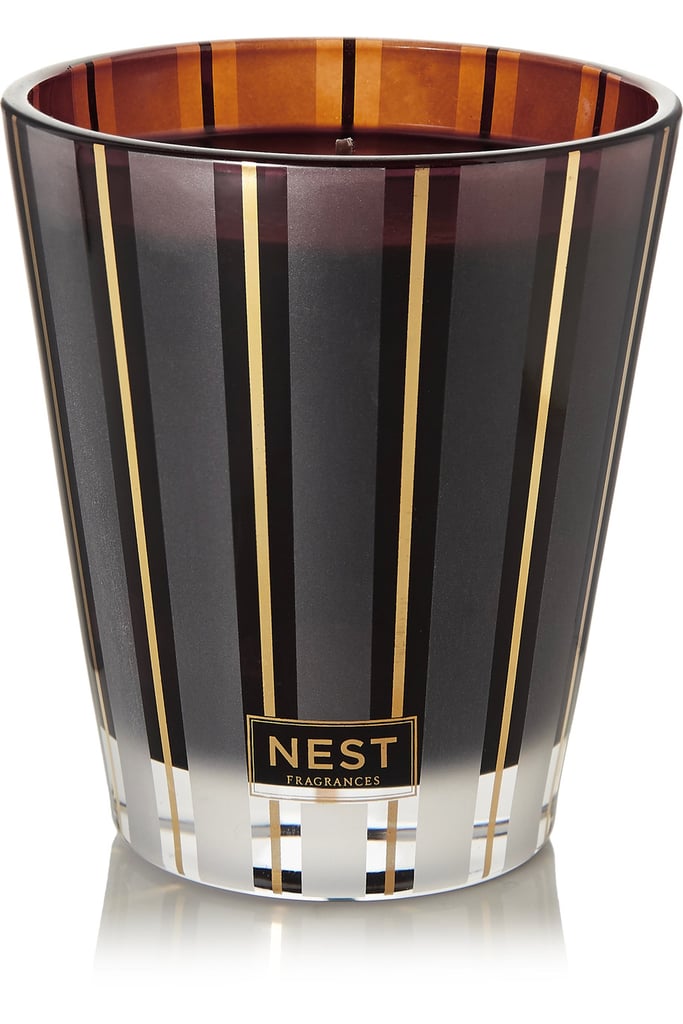 Nest Hearth classic candle ($40), with notes of oud wood, frankincense, and smoky embers.