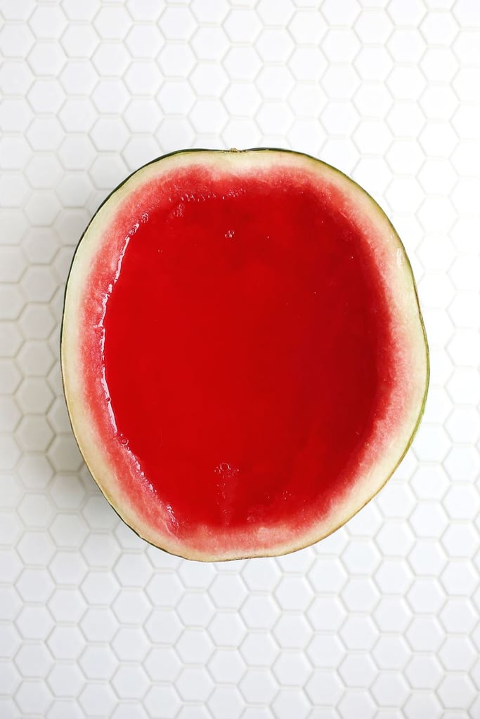 Once the jello is set, use a large knife to cut the slices like you normally would. The jello fills into the watermelon some so the top level shrinks a bit. Just use the knife to even out any rind that sticks up higher than your slices, and you're ready to serve your shots!