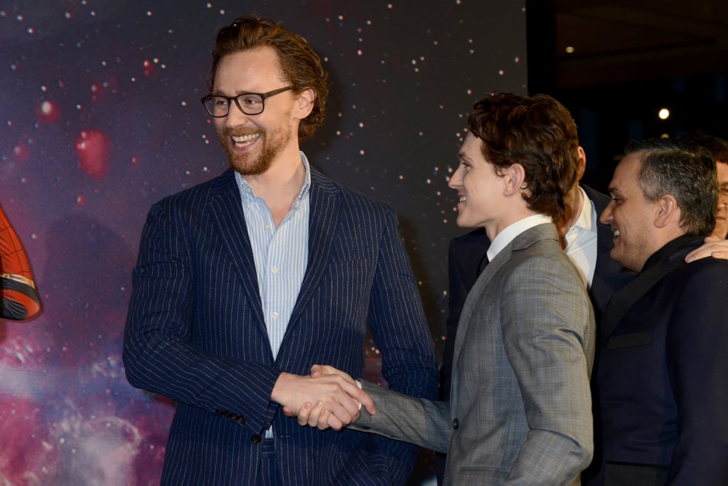 Tom Hiddleston and Tom Holland shook hands at the UK fan event for Avengers: Infinity War.