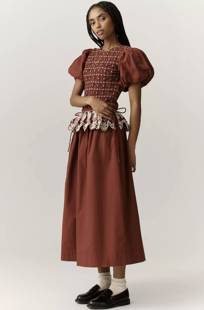 Damson Madder Audrey Puff-Sleeve Organic Cotton Midi Dress ($215)
I'm a huge fan of the London-based fashion brands that create dresses with romantic flourishes and a vintage feel. Damson Madder is my current obsession, and I love them even more for working with recycled materials and committing to small-batch manufacturing. This particular dress features puff shoulders, a demure midi hemline, and gorgeous embroidery on the bodice and removable peplum waist.