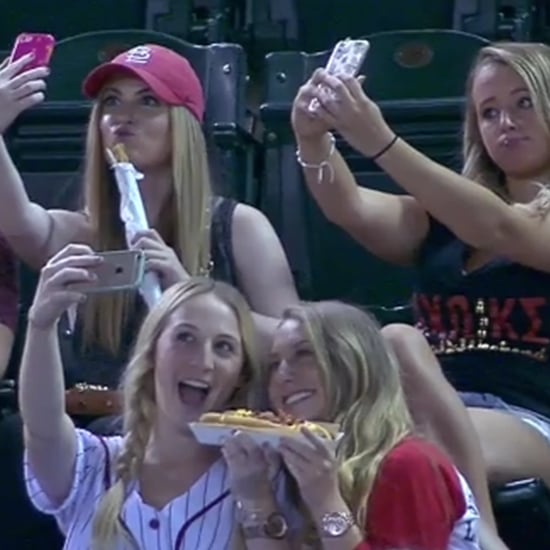 Girls Take Selfies at Baseball Game