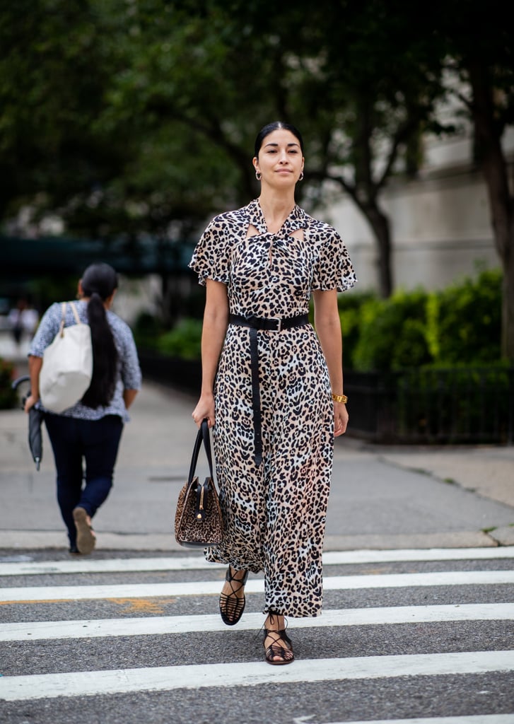 Styling the dress with a long black belt.