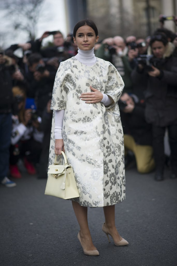 If your end-of-week plans involve a brunch or afternoon party and a polished look is required, consider using a pastel-hued accessory as the final touch to your look. Miroslava Duma's brocade coat would be chic enough on its own, but the addition of a buttery-yellow top-handle bag finishes it off perfectly.