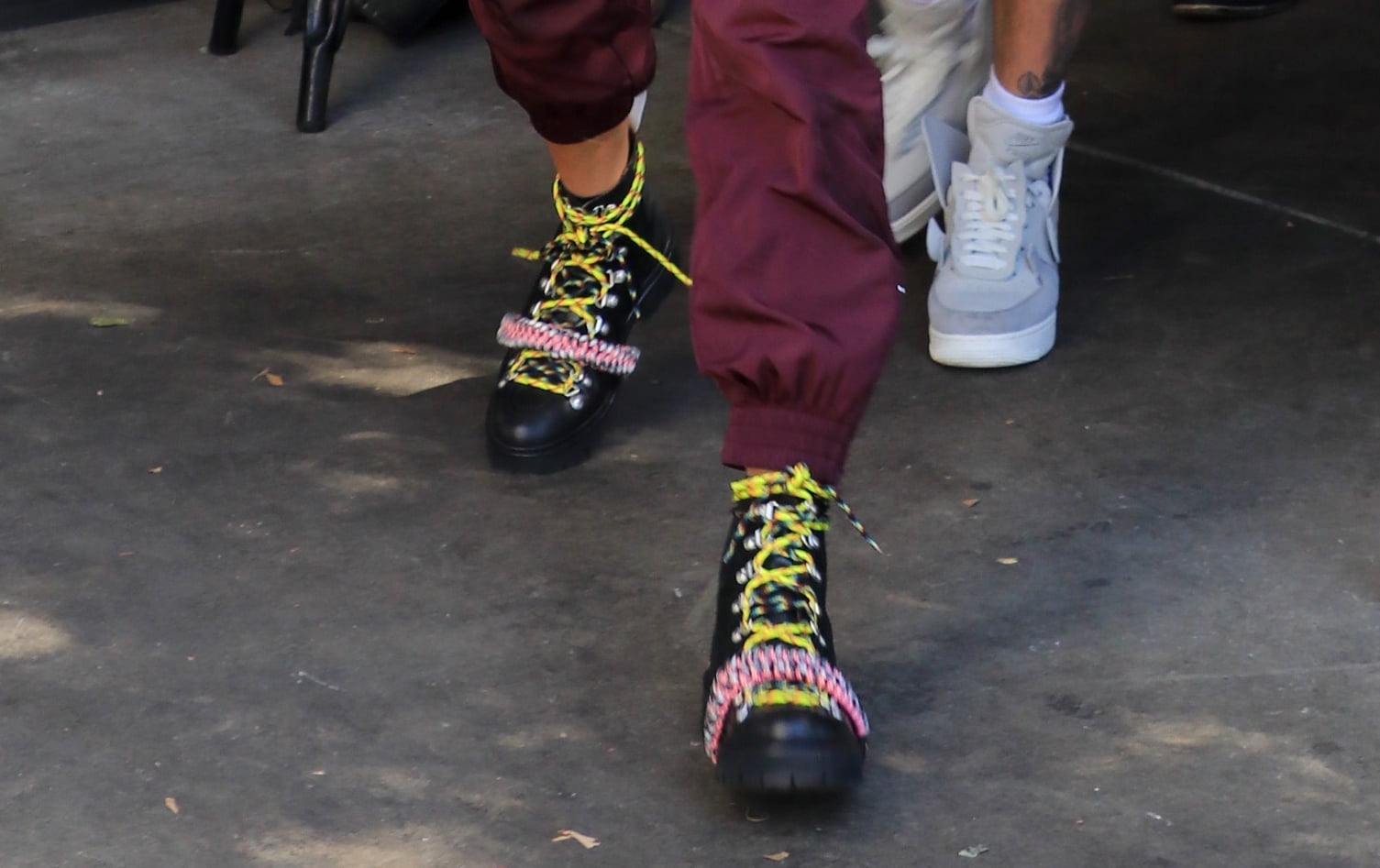 Black boots with yellow laces store