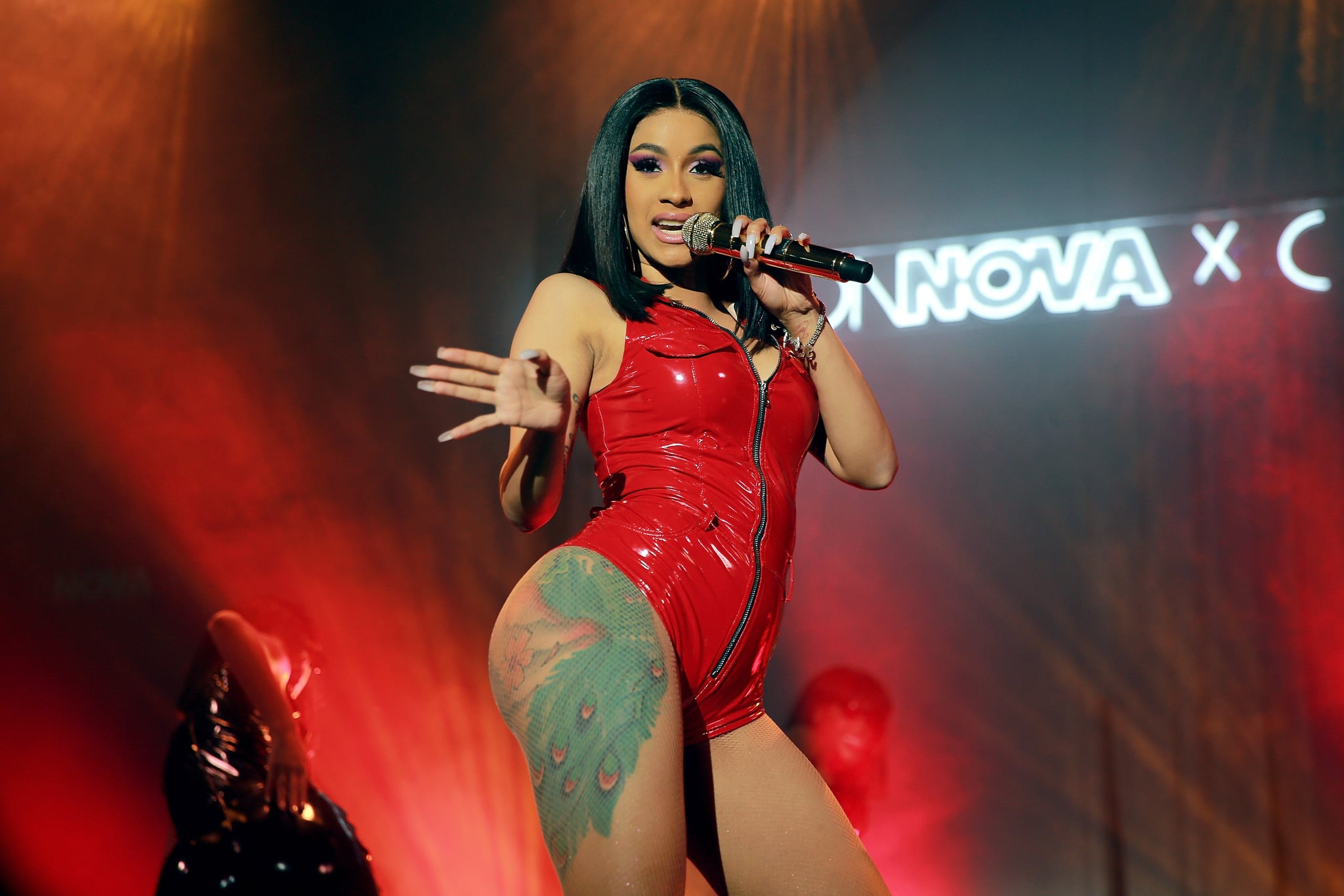 HOLLYWOOD, CA - NOVEMBER 14:  Cardi B performs onstage during the Fashion Nova x Cardi B Collaboration Launch Event at Boulevard3 on November 14, 2018 in Hollywood, California.  (Photo by Rich Fury/Getty Images for Fashion Nova)