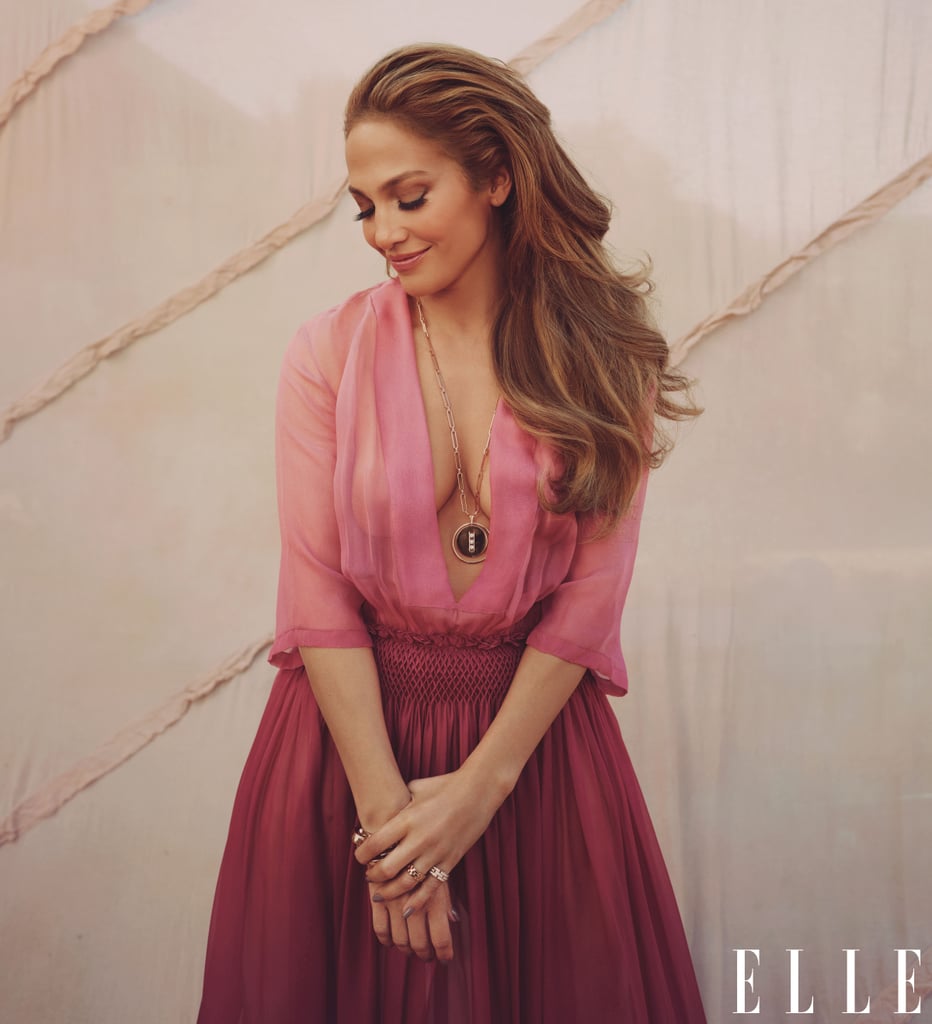 J Lo wears a Dior dress with a Messika Paris necklace, Pomellato bracelets, and Cartier rings.