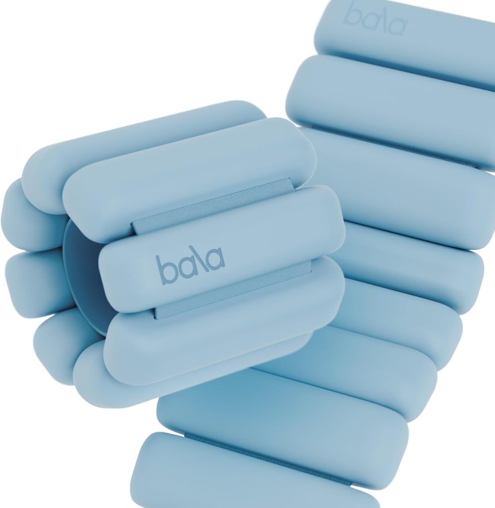 Bala Bangles Wrist & Ankle Weights ($49, originally $65)
Who says wrist and ankle weights can't double as accessories? Bala proves they can with these sleek, design-forward styles. Available in one-, two-, and three-pound options, these weights make it easy to level up your fall walks. Learn more about them in our Bala Bangles Wrist & Ankle Weights review.
Editor Quote: "I love these weights because they're super easy to put on and adjust. They're comfortable, and they make me feel like I can take on the world — or my hour-long Pilates class. I've also worn them on walks around my neighborhood for a little extra burn. The one pound is great because it's enough weight to feel something, while being light enough to maintain for a full workout." — India Yaffe, former associate shopping editor