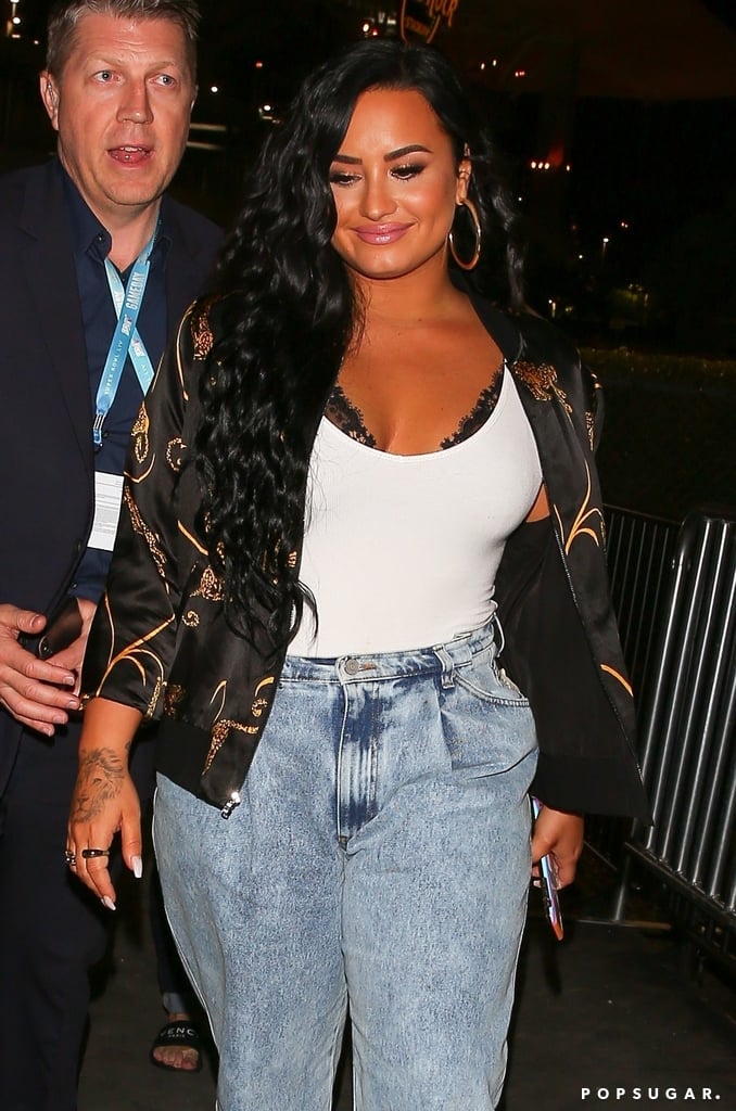 Demi Lovato's Cute Super Bowl Outfit With Jeans and Sneakers