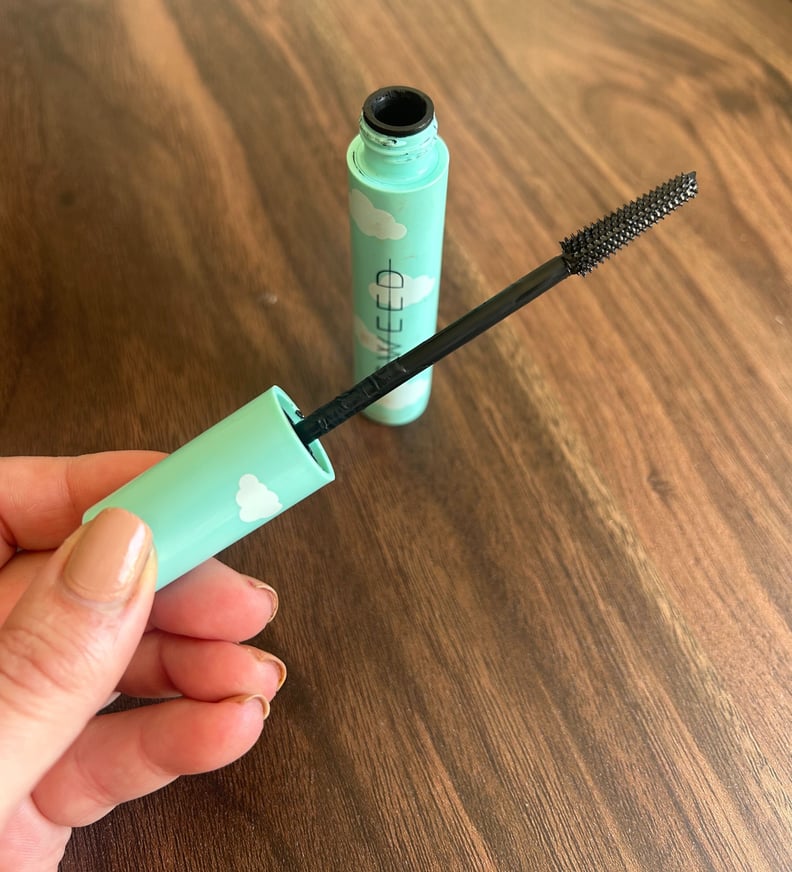 Sweed Lash Lift Mascara Wand and Bottle on wooden table