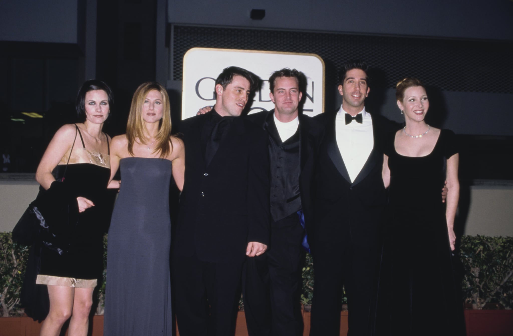 The cast of 'Friends' (American actress Courteney Cox, American actress Jennifer Aniston, American actor and comedian Matt LeBlanc, American-Canadian actor and comedian Matthew Perry, American actor and comedian David Schwimmer, and American actress and comedian Lisa Kudrow) attend the 55th Golden Globe Awards, held at the Beverly Hilton Hotel in Beverly Hills, California, 18th January 1998.  (Photo by Vinnie Zuffante/Getty Images)