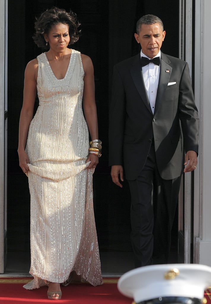 Wearing Naeem Khan at a state dinner with German Chancellor Angela Merkel and her husband, Joachim Sauer, in 2011.
