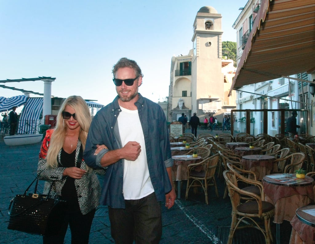 Eric and Jessica walked arm in arm during a vacation in Italy in October 2013.