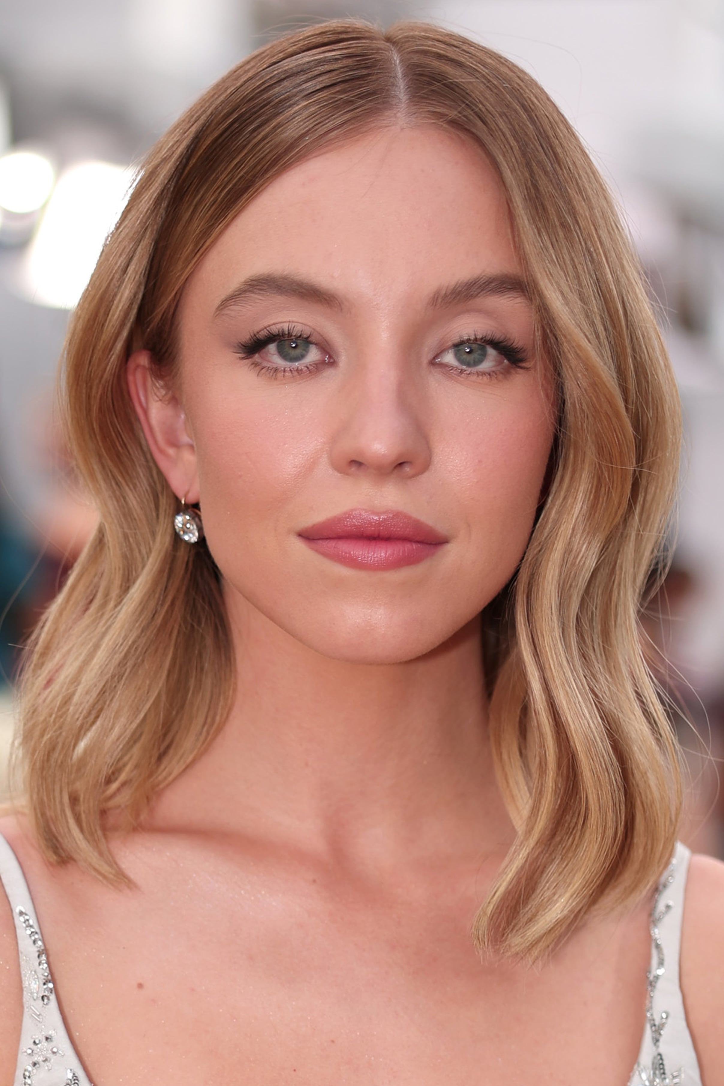 Sydney Sweeney's Blue Fishnet Dress For Armani Beauty Event | PS Fashion
