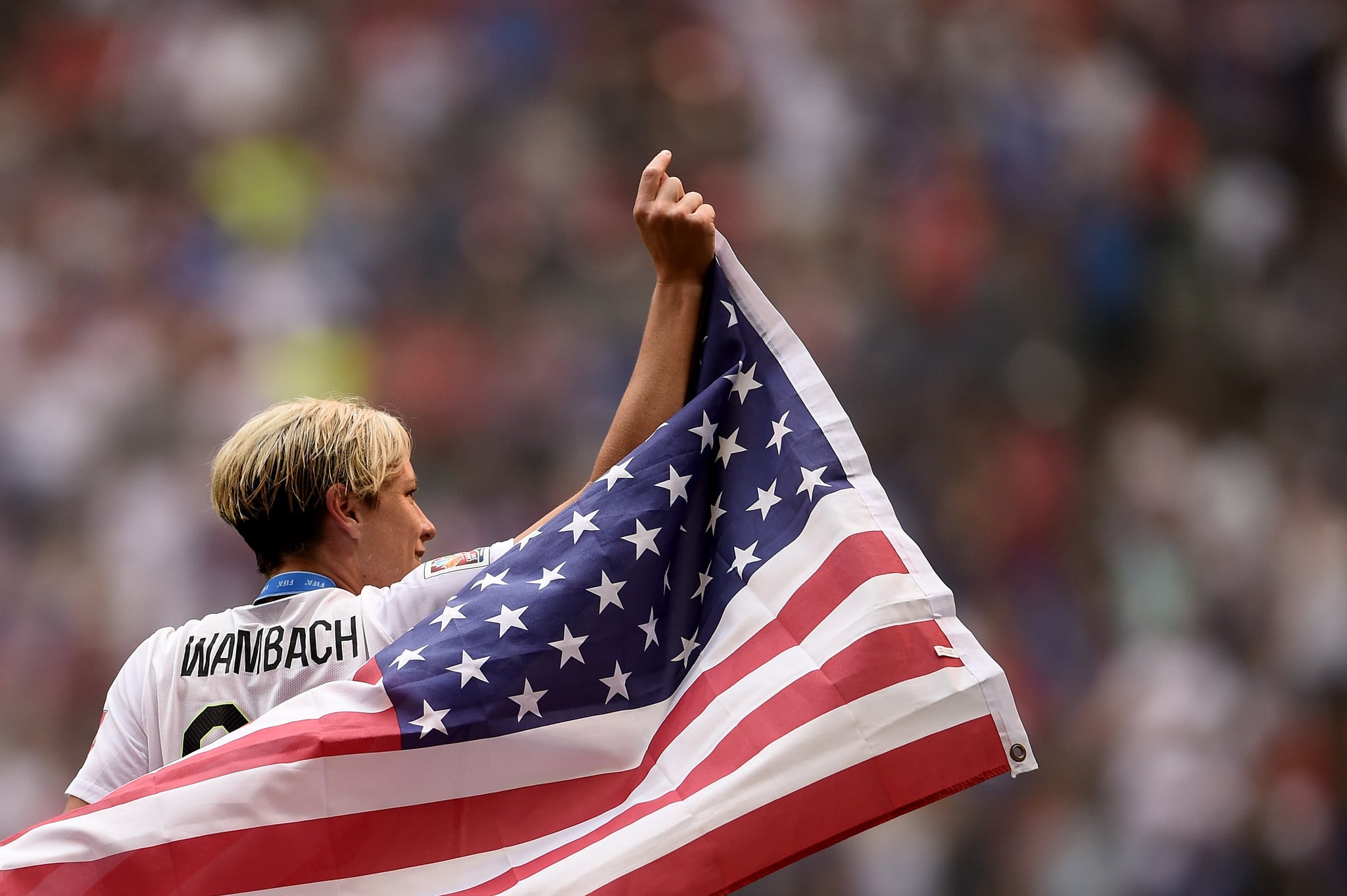 VANCOUVER, BC - JULY 05:  Abby Wambach #20 of the United States of America celebrates after their 5-2 win over Japan in the FIFA Women's World Cup Canada 2015 Final at BC Place Stadium on July 5, 2015 in Vancouver, Canada.  (Photo by Dennis Grombkowski/Getty Images)