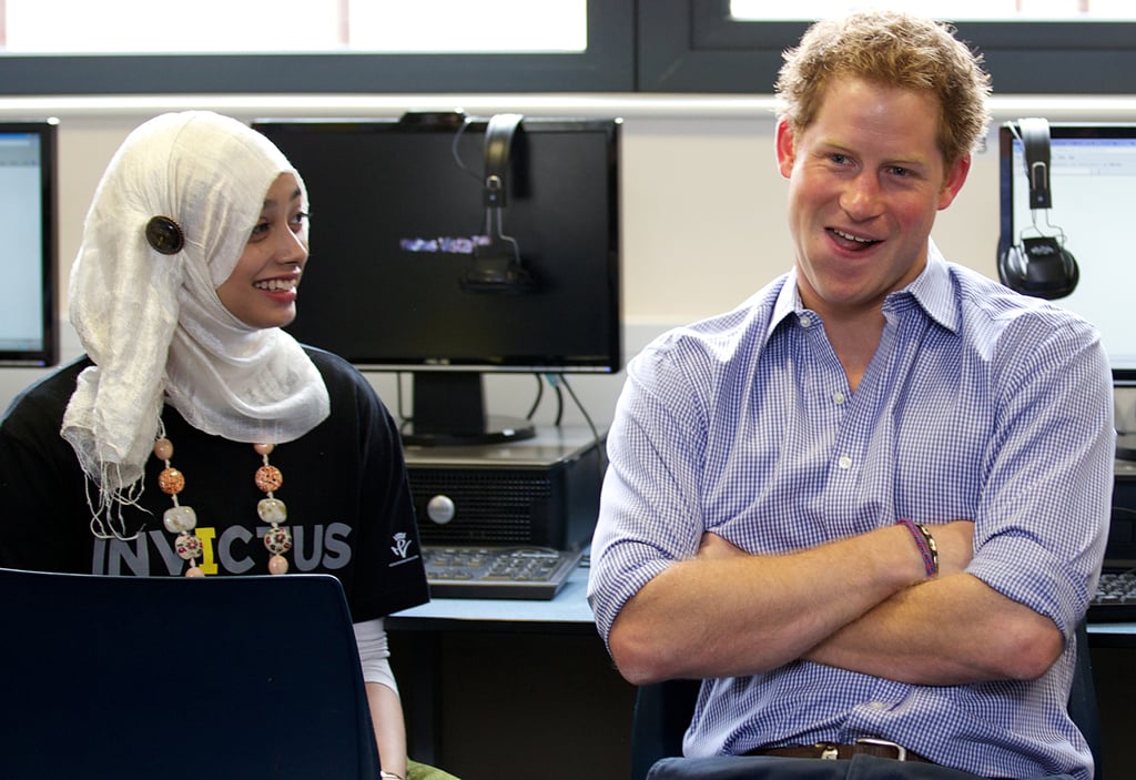 Prince Harry sat with a student at an Invictus Games initiative in London on Monday.