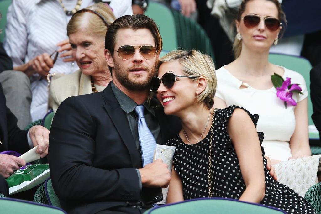Chris Hemsworth and Elsa Pataky cozied up at the Wimbledon men's final match on Sunday in London.