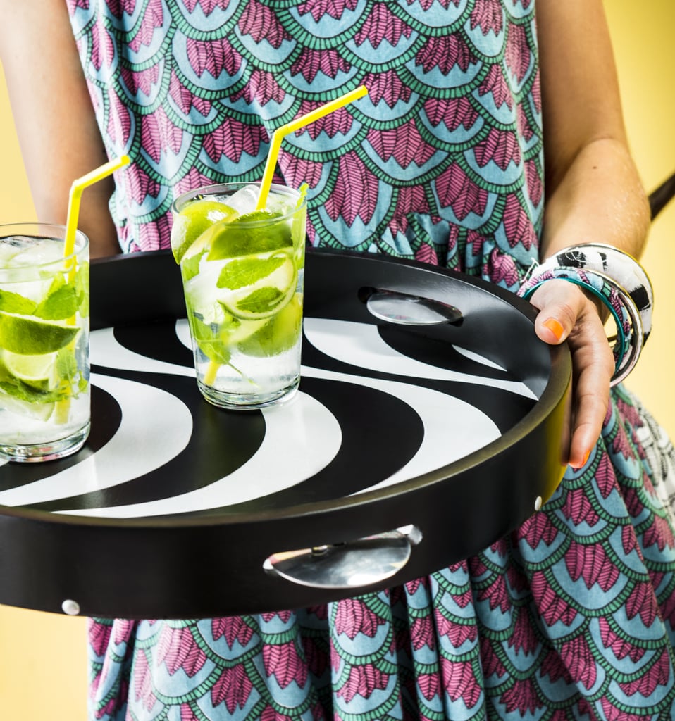 We can't wait to serve Spring cocktails on this tambourine tray ($20).