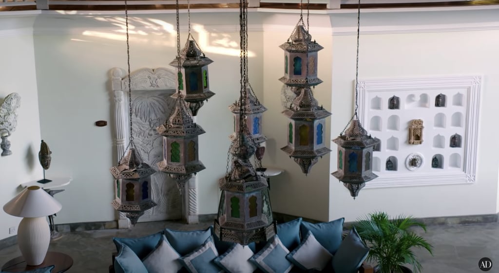 The gorgeous chandeliers feature Moroccan-inspired details.