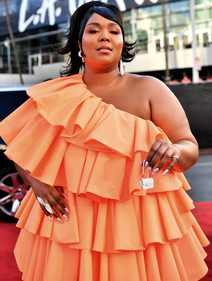 Lizzo's Miniature Valentino Bag and Orange Dress at the AMAs