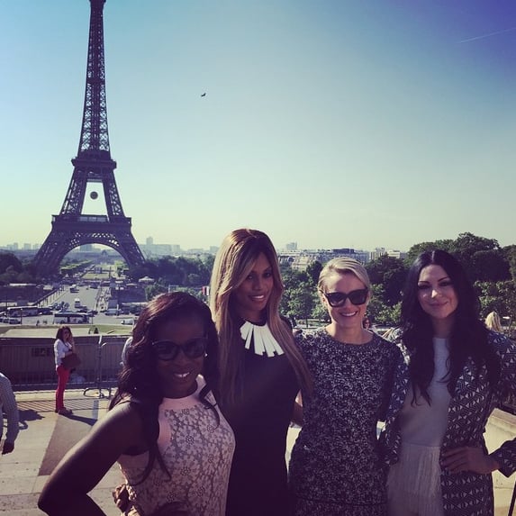 Uzo Aduba, Laverne Cox, Taylor Schilling, and Laura Prepon linked up for a picture-perfect photo in front of the Eiffel Tower in Paris.