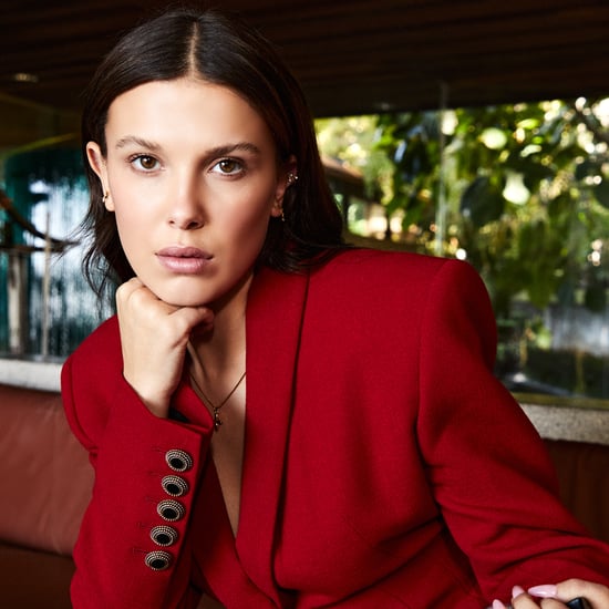 Millie Bobby Brown Wears a Red Micro Miniskirt For Essentia
