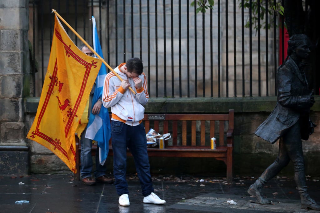 A "Yes" supporter cried while walking home in Edinburgh after the results were announced.