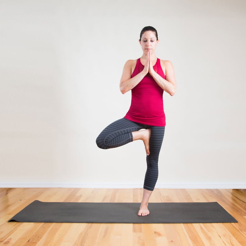 Adho Mukha Vrkasana in Padmasana (Lotus Pose in Downward Facing Tree Pose)