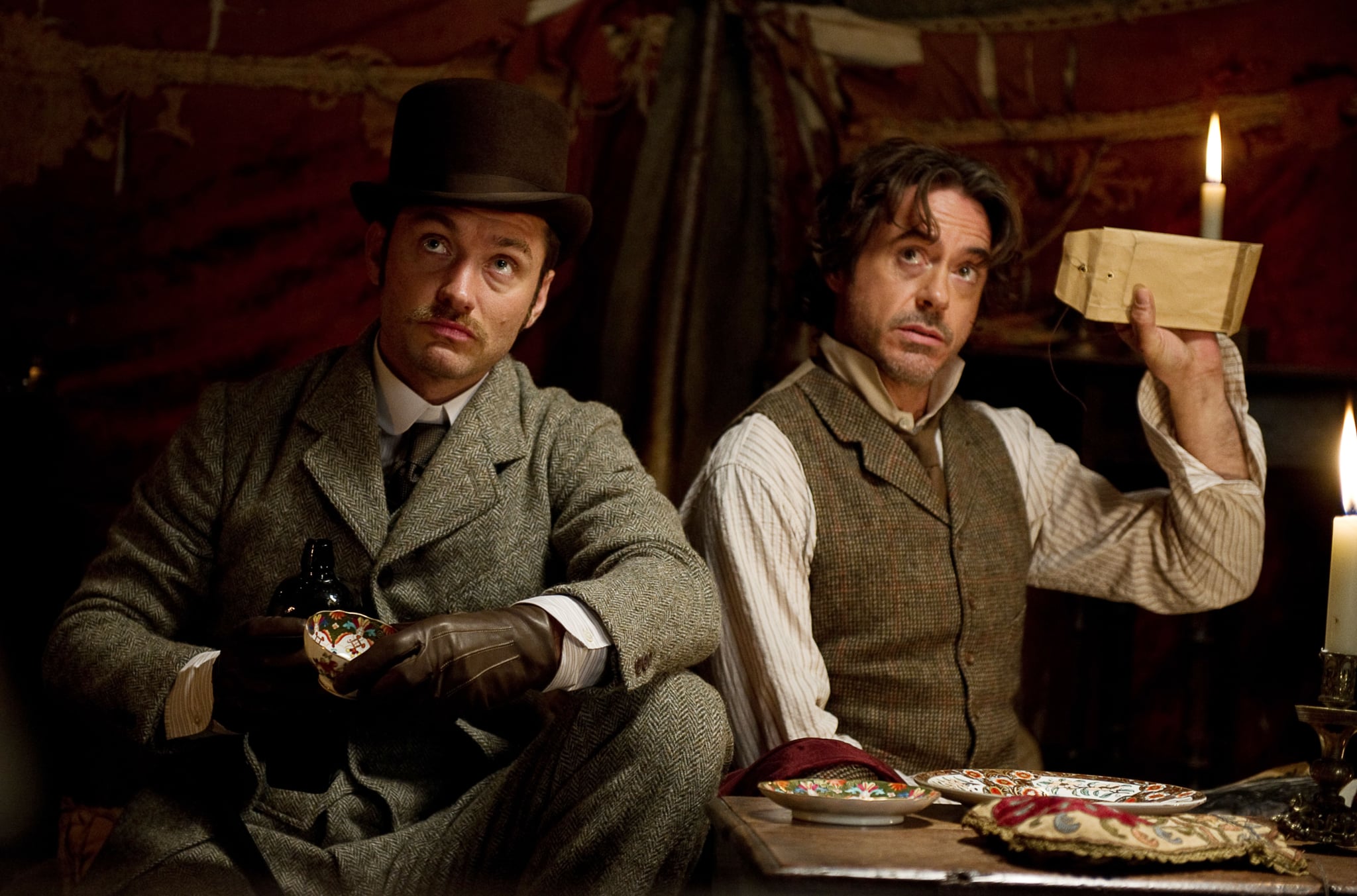 SHERLOCK HOLMES: A GAME OF SHADOWS, from left: Jude Law, Robert Downey Jr., 2011. ph: Daniel Smith/Warner Bros./courtesy Everett Collection