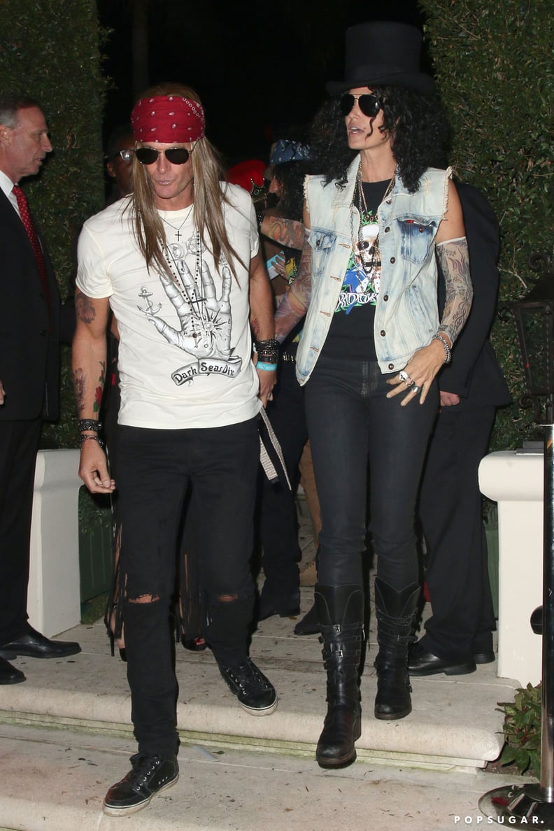 Cindy Crawford and Rande Gerber as Slash and Axl Rose in 2013