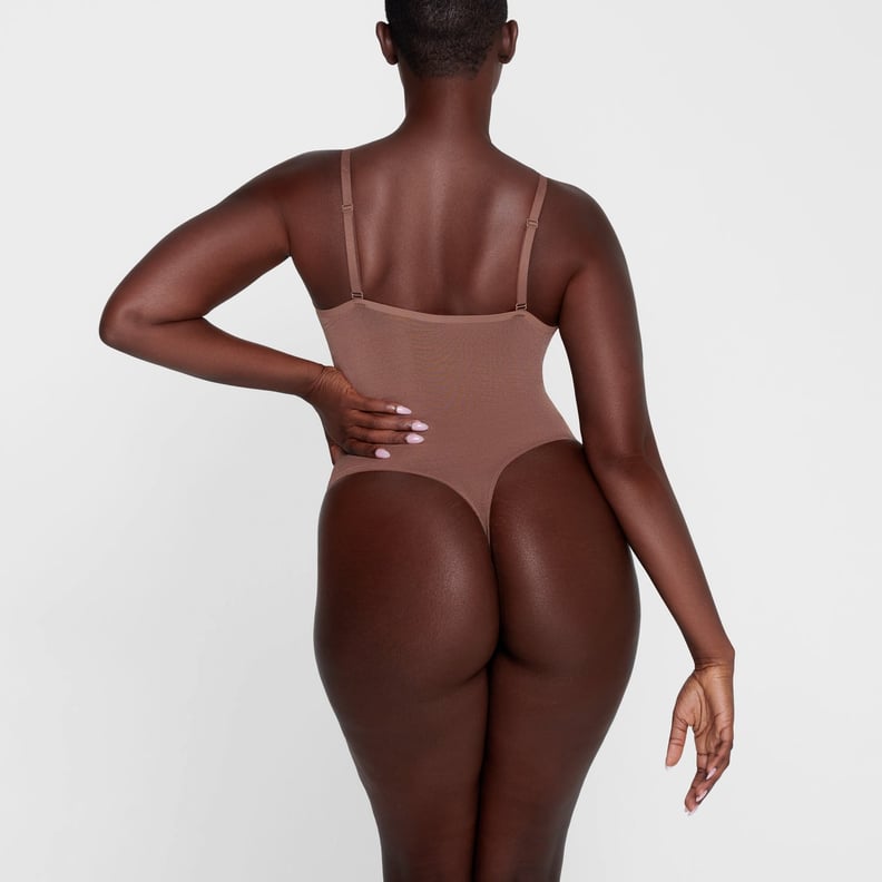 SKIMS - The Sheer Sculpt Thong Bodysuit ($54). Its silky