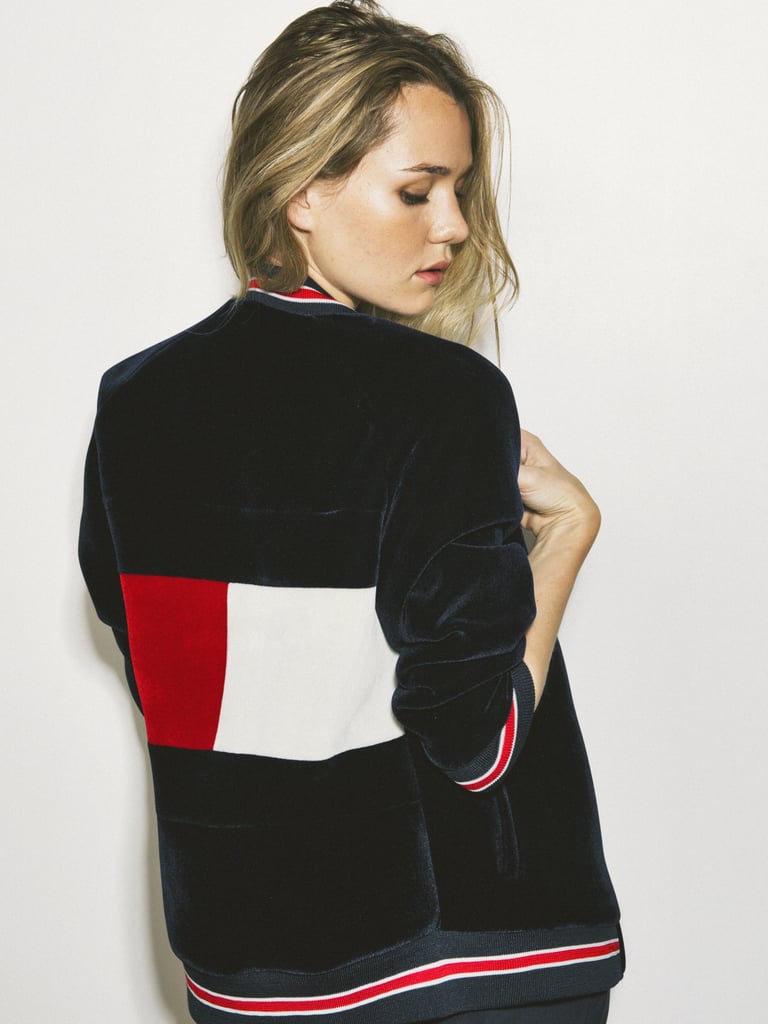 Immy Waterhouse wearing the Varsity Velvet Bomber Jacket.