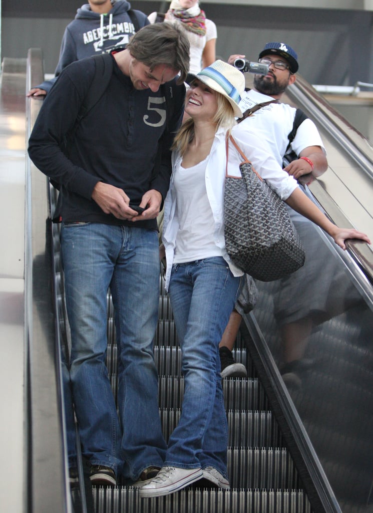 Kristen grinned from ear to ear while arriving at LAX with Dax in July 2008. Kristen grinned from ear to ear while arriving at LAX with Dax in July 2008.