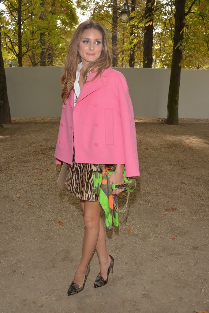 Olivia Palermo tempered a leopard-print miniskirt with a bright pink peacoat while taking in the shows during Paris Fashion Week Spring/Summer 2014. In true Olivia fashion, the star finished her look with camouflage pumps and a matching Valentino bag. 
Where to Wear: Champagne brunch with Mom. Valentine's Day is about celebrating all loved ones.