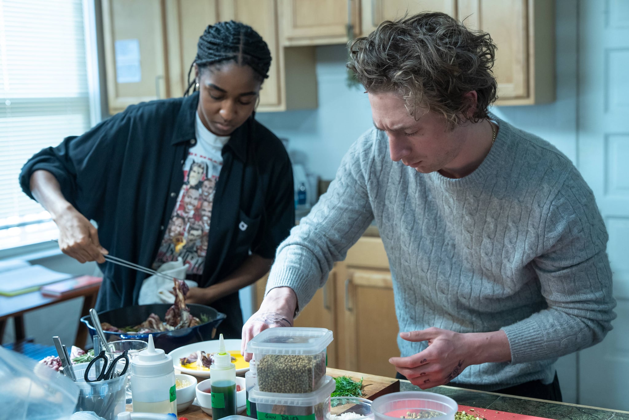 THE BEAR — Sundae — Season 2, Episode 3 (Airs Thursday, June 22nd) Pictured: (l-r) Ayo Ebebiri as Sydney Adamu, Jeremy Allen White as Carmen Carmy Berzatto. CR: Chuck Hodes/FX.