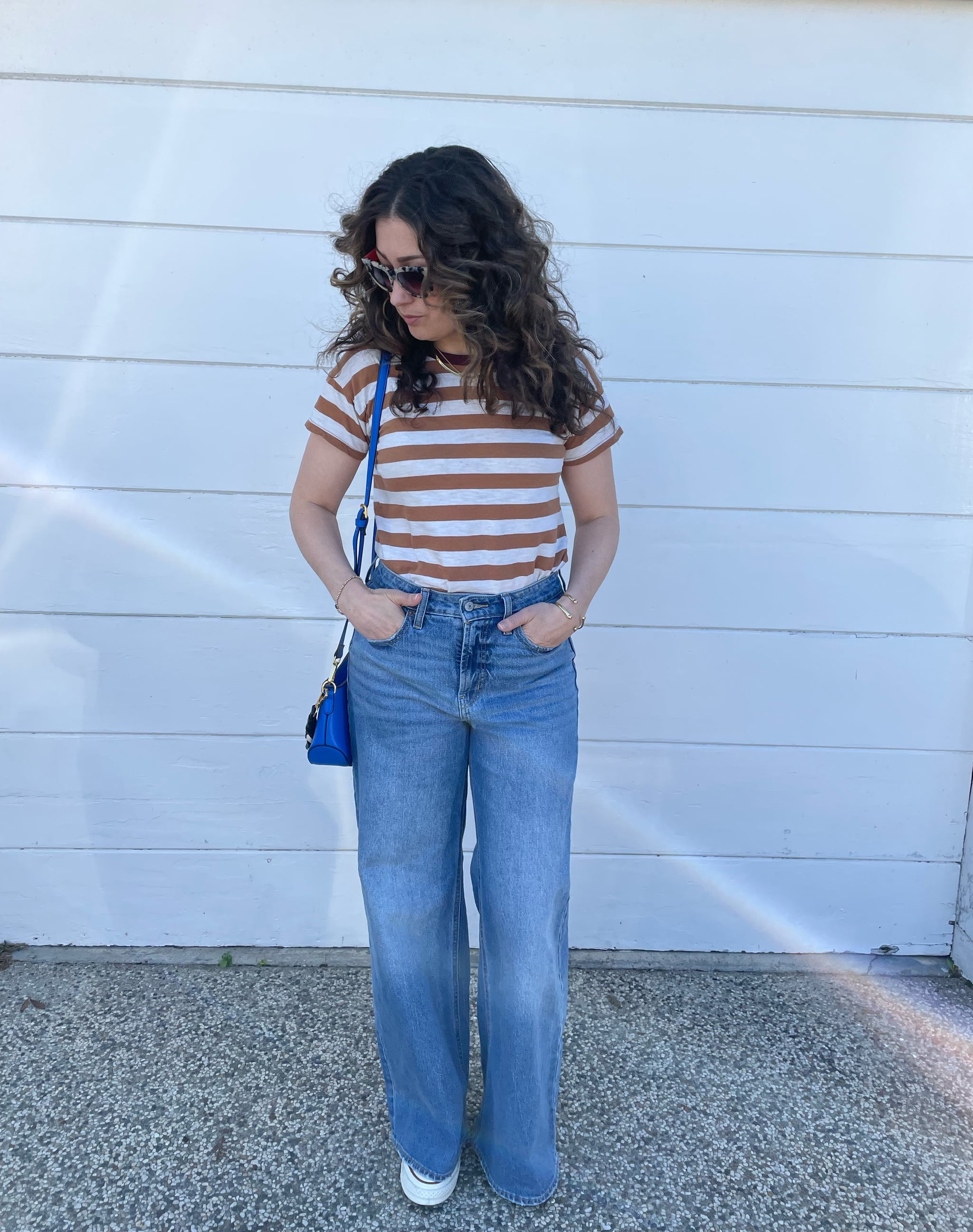 woman wearing Old Navy's high-waisted, wide-leg jeans