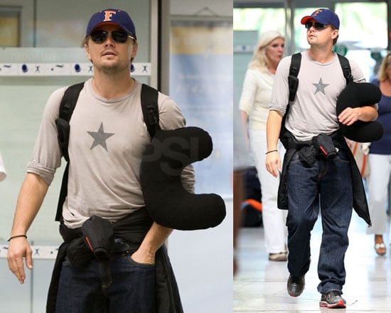 Photos Of Leonardo Dicaprio At Nice Airport With His Neck Pillow Popsugar Celebrity