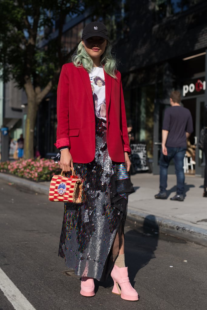 An easy way to try the red and pink combination? Start with a pink or red shoe and build your outfit from there. This street style star threw a bright blazer over her sequined skirt and graphic top and really brought the look together with her pastel pink pumps.
