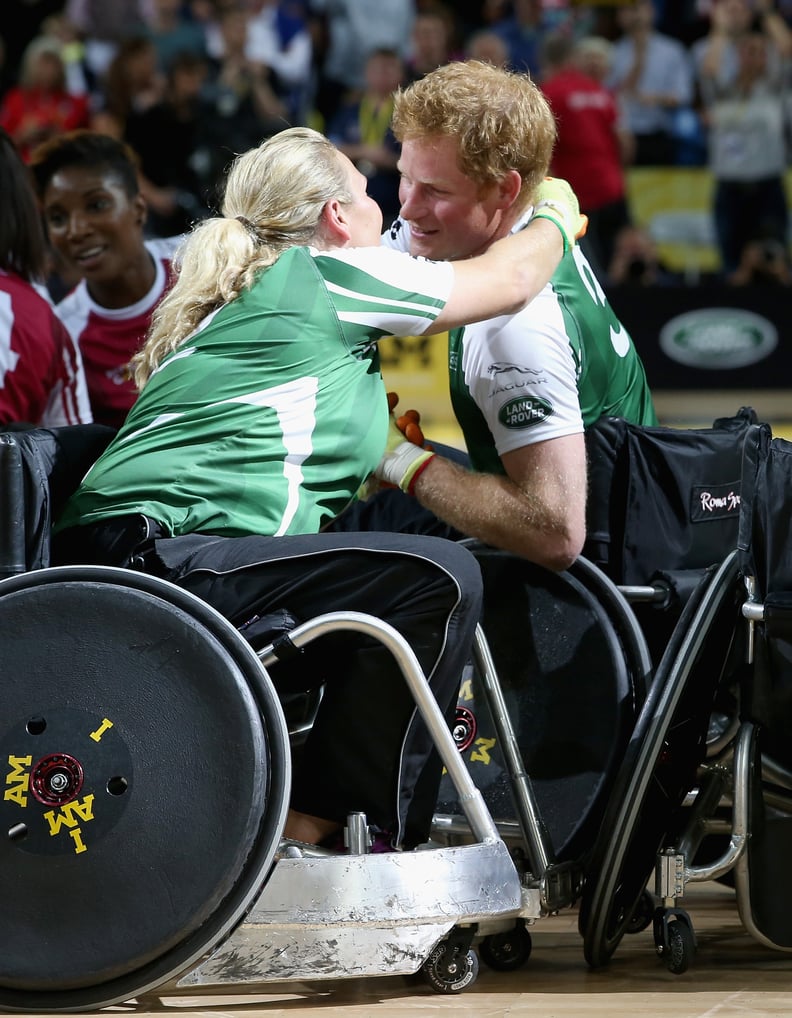 Harry and Zara Phillips hugged while competing in an Exhibition wheelchair rugby match at the Copper Box in 2014.