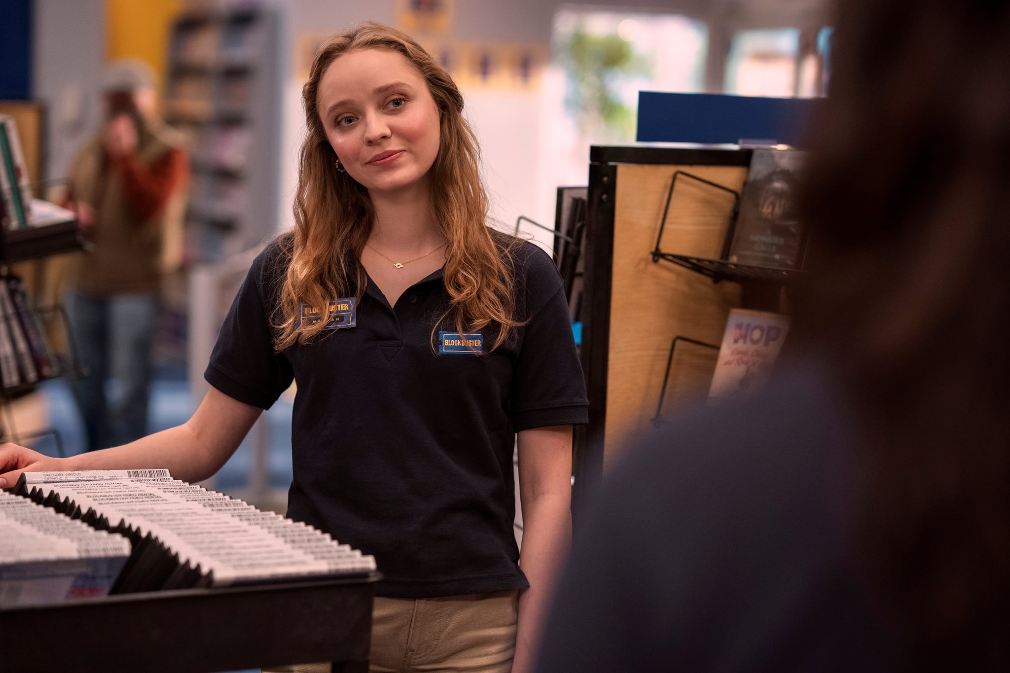 Blockbuster. Madeleine Arthur as Hannah in episode 107 of Blockbuster. Cr. Ricardo Hubbs/Netflix © 2022